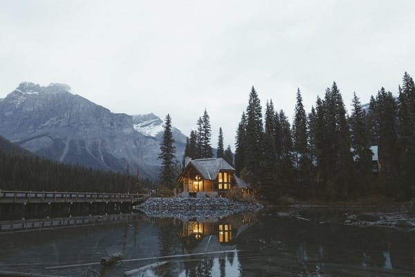 Cottage In Mountains By Lake And Woods
