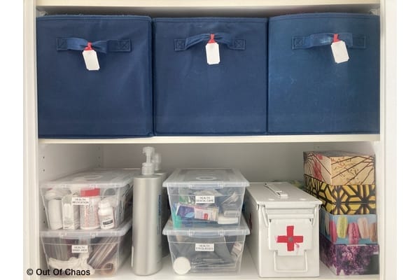 bins in closet showing hanging labels with smaller bins showing printed labels