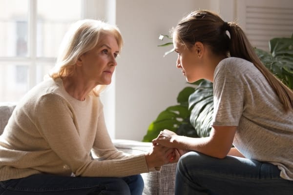 Different Generations Women Talking Holding Hands Giving Psychological Support